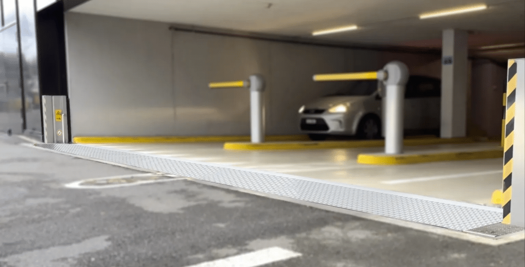 car park Spill barrier flood protection installed at a car park entrance.