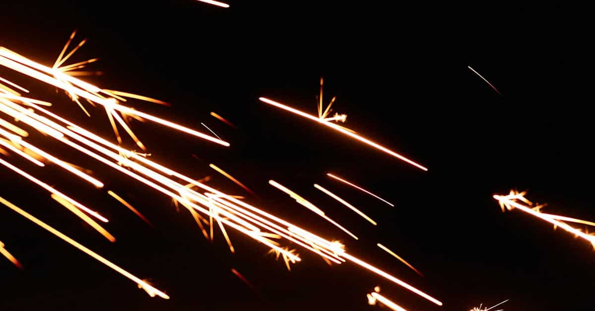 fire causes in chemical industry fire causes in the chemical industry - Captivating shot of bright orange sparks against a black backdrop, creating a dynamic effect.